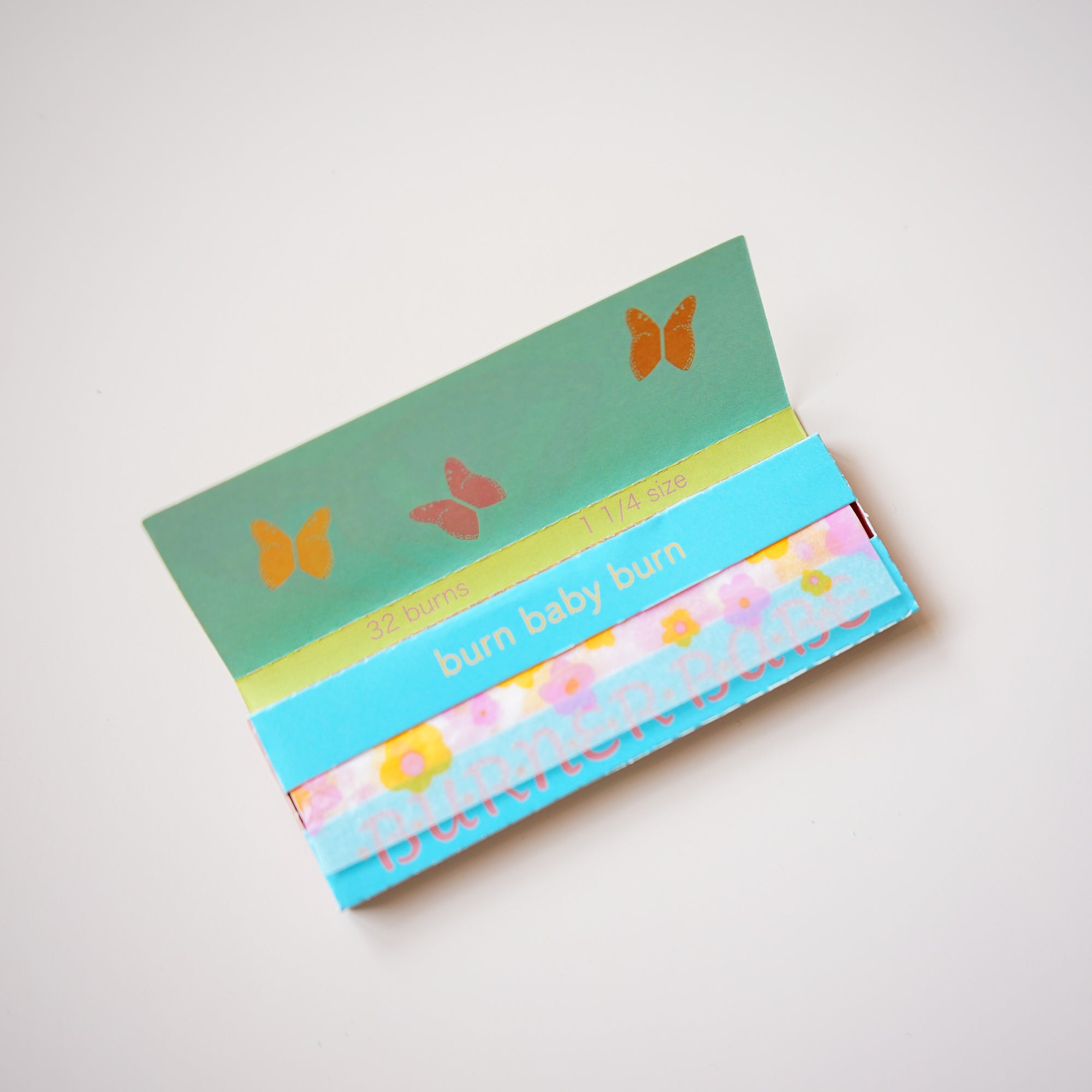 cute rolling papers with a floral print from burner babe